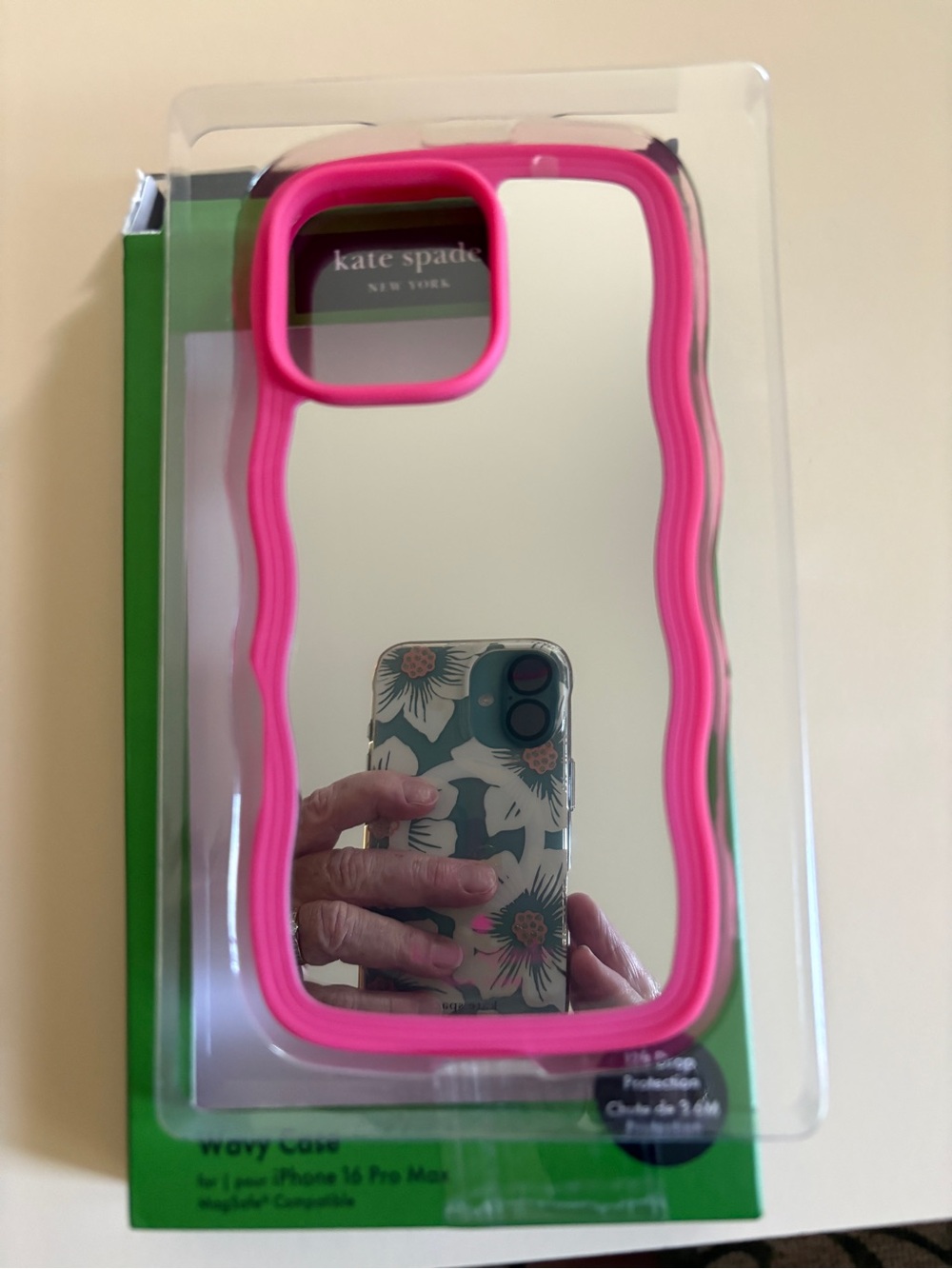 kate spade mirrored iPhone case with hot pink wavy bumper